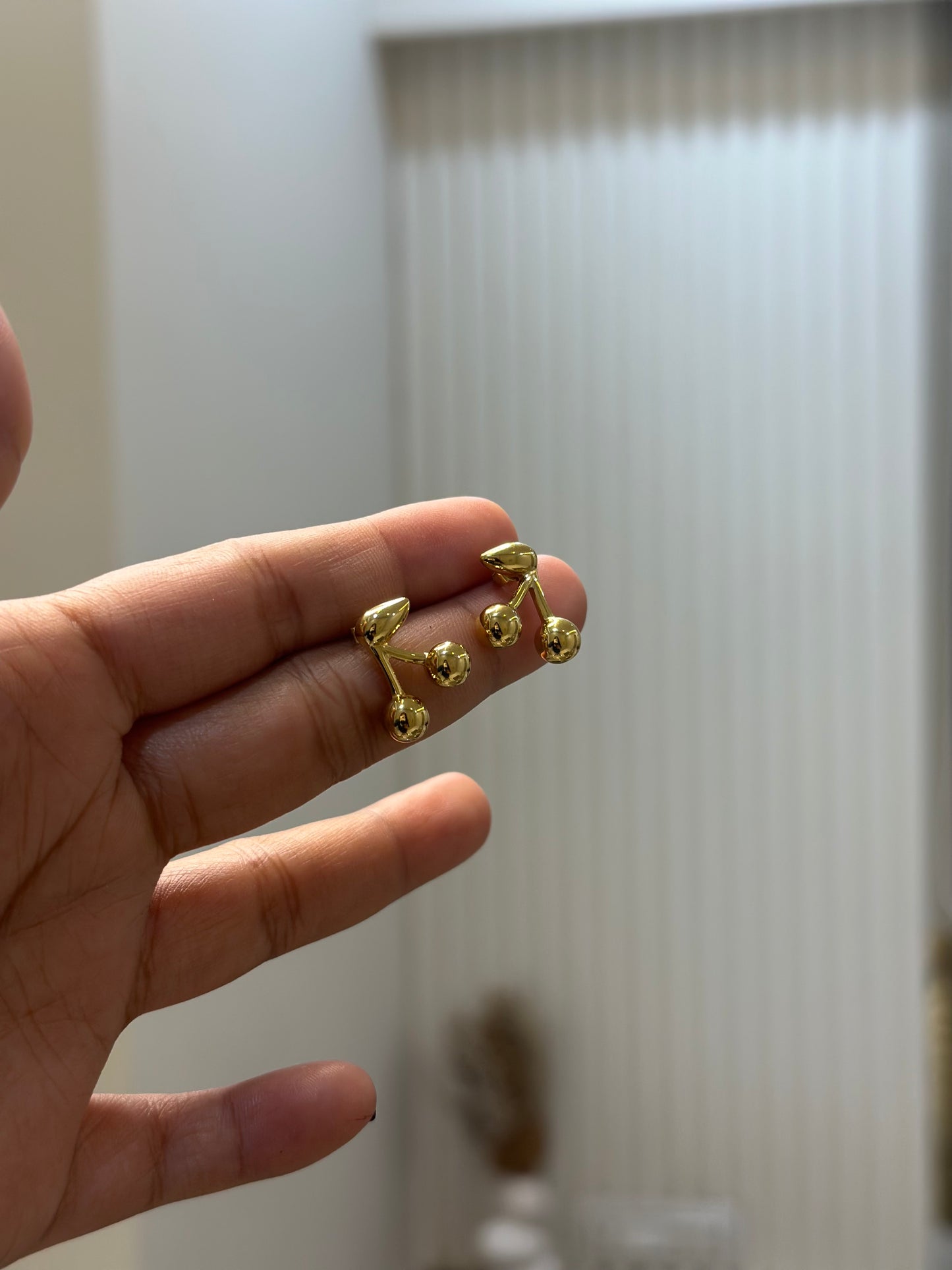 Cherry statement studs