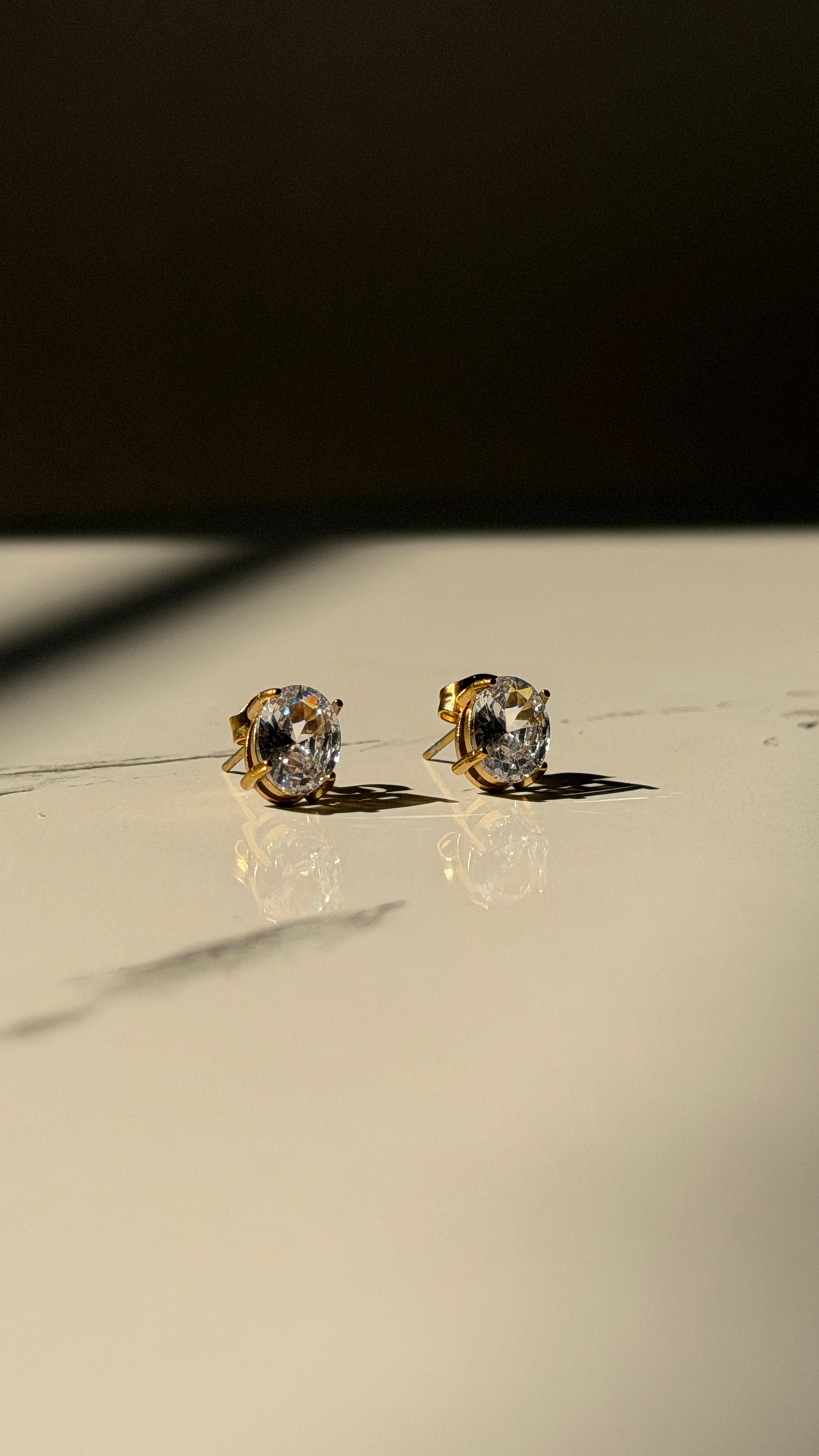 Solitaire stud earrings