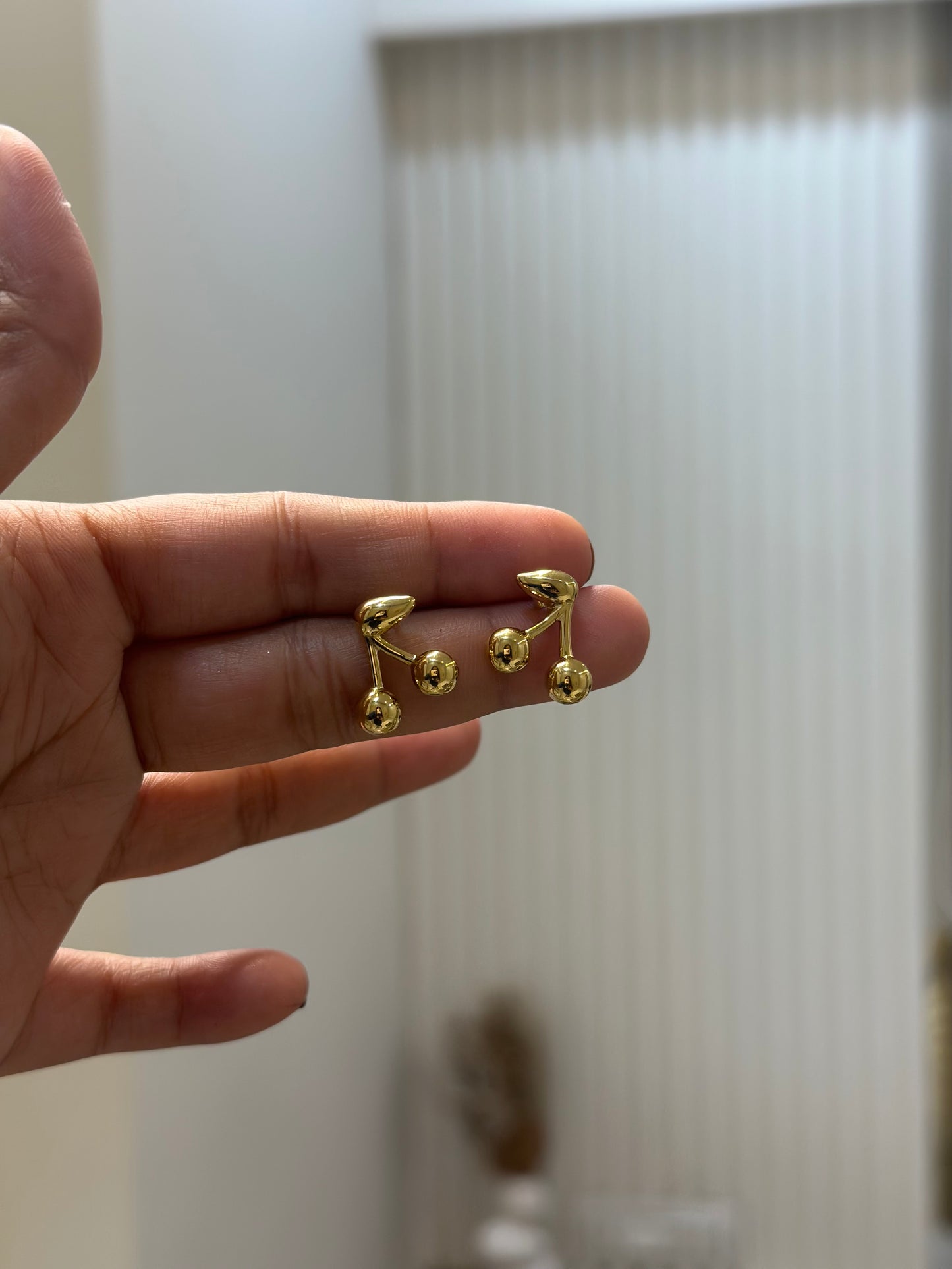 Cherry statement studs