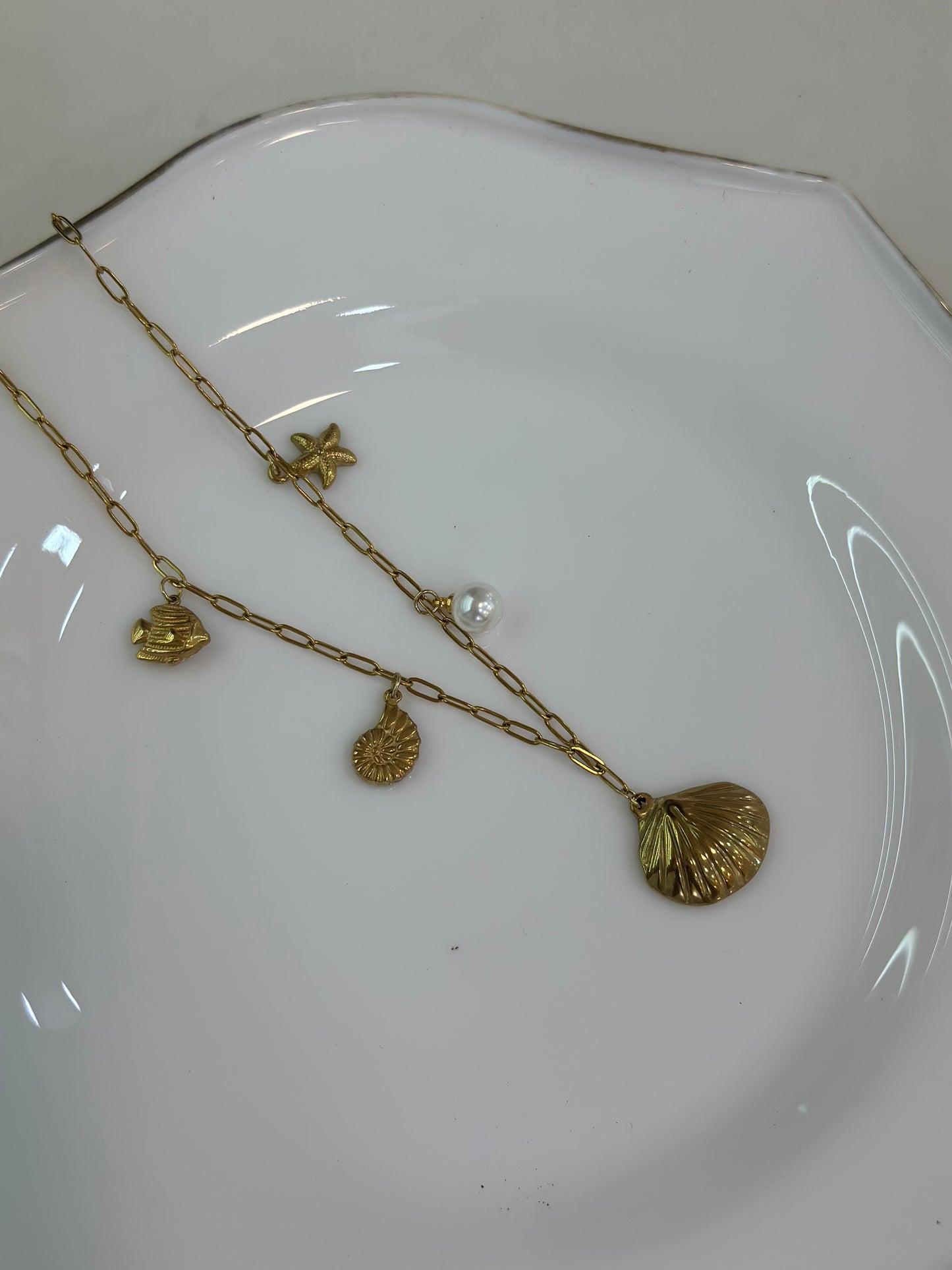 Shell multicharm necklace