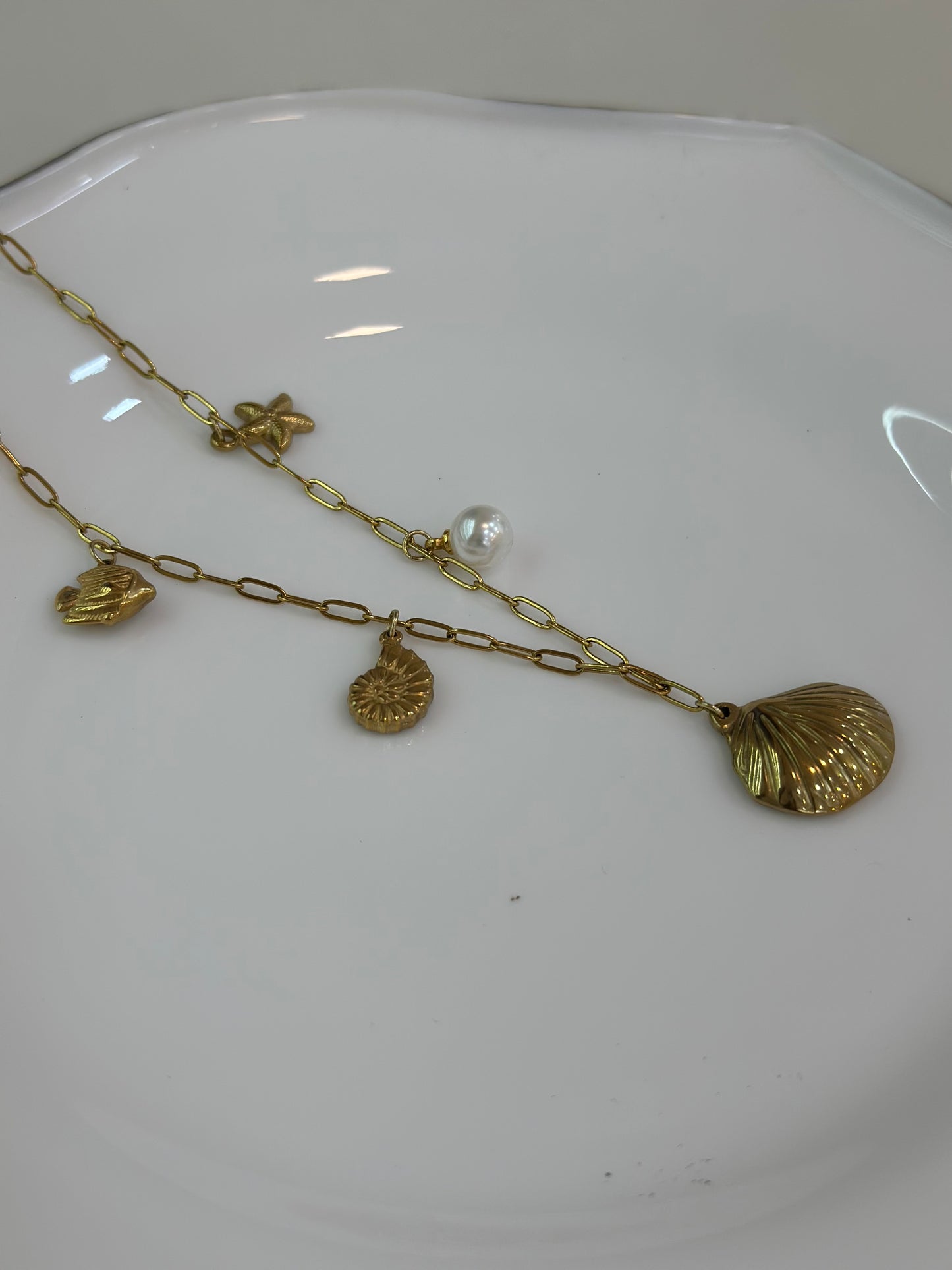 Shell multicharm necklace