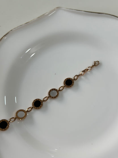 Roman statement bracelet
