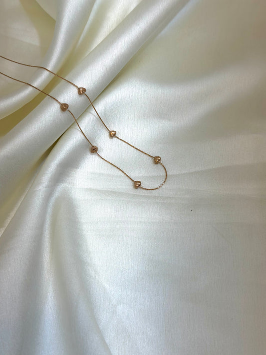 Miral multi-charm heart necklace