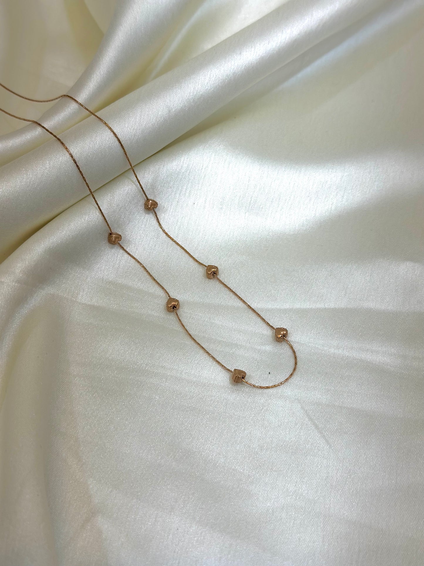 Miral multi-charm heart necklace