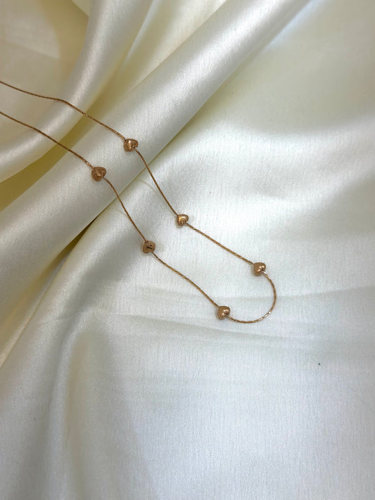 Miral multi-charm heart necklace