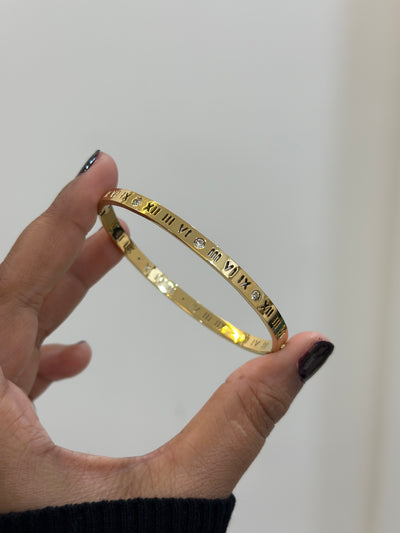 Studded roman statement bracelet