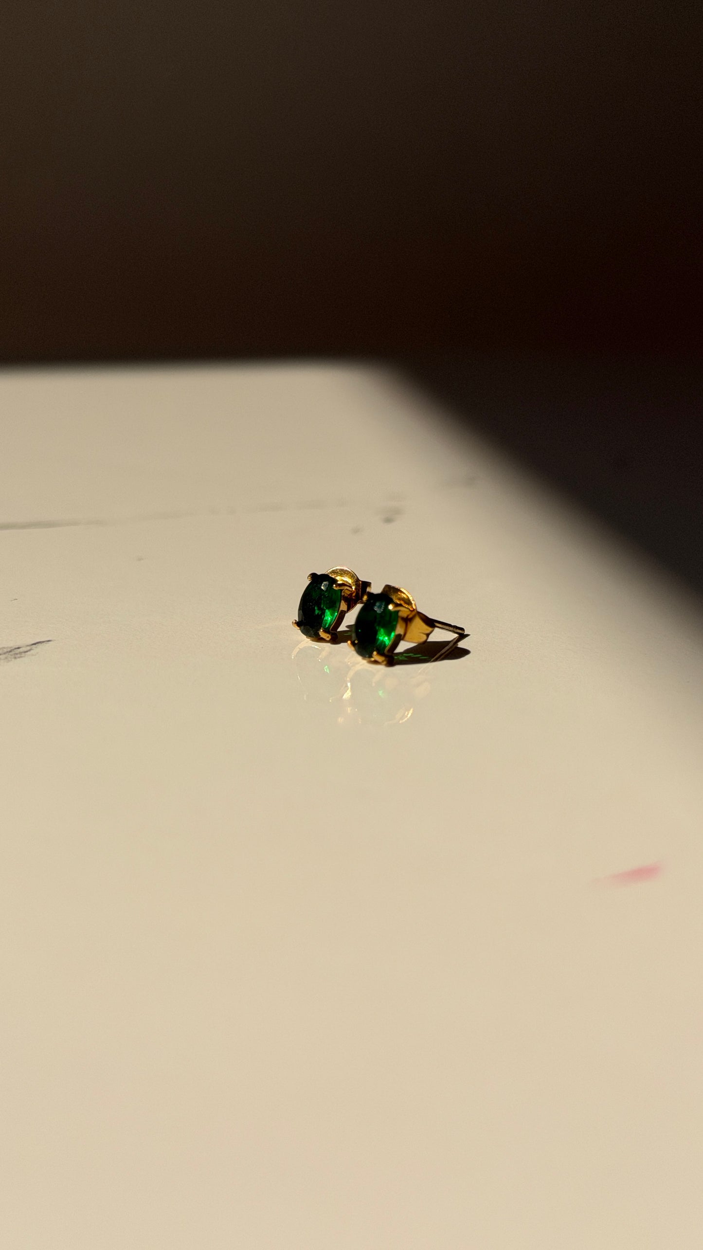 Emerald stud earrings
