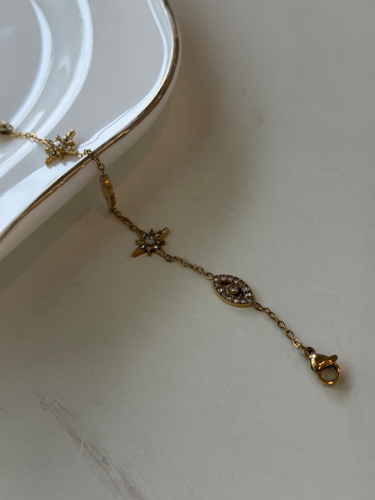 Evil eye studded chain bracelet