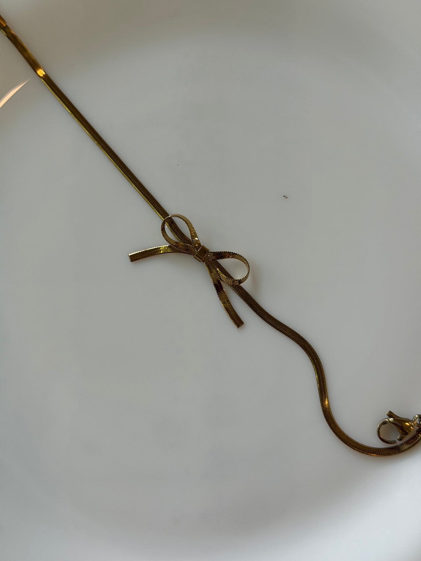 Bow chain bracelet