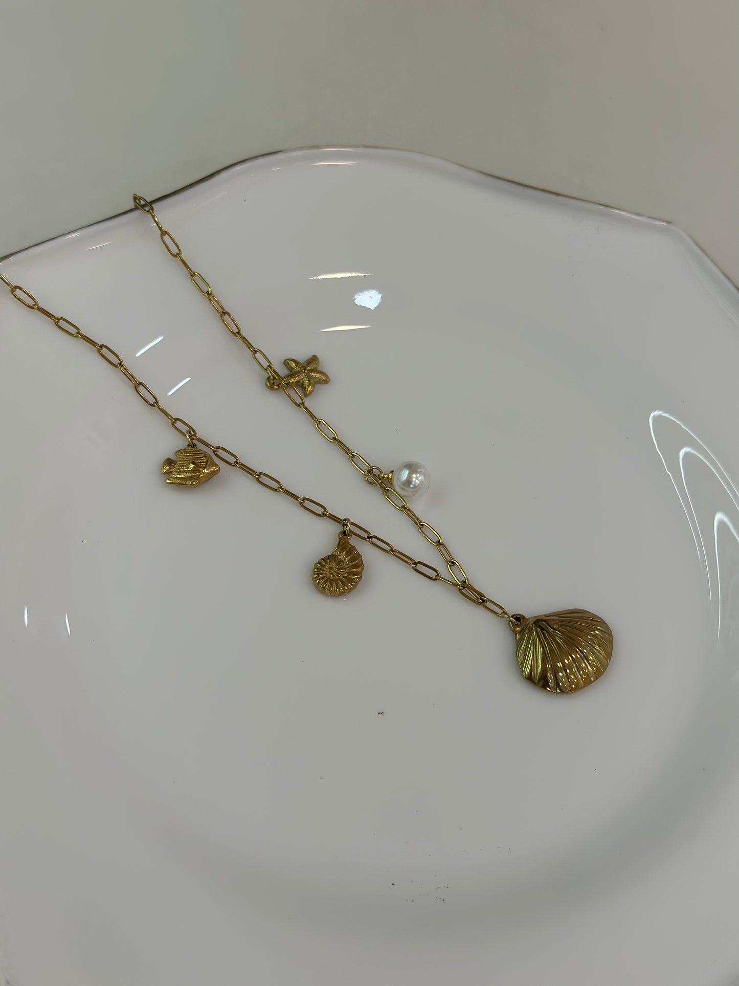 Shell multicharm necklace